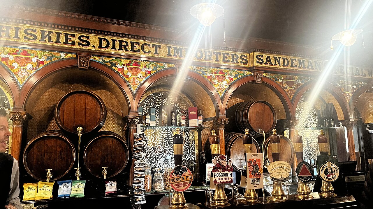 The ornate tiled interior and bar of The Crown Liquor Saloon